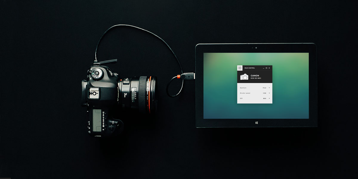 A Windows laptop connected to a DSLR camera